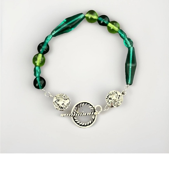 Hand Crafted Jewelry - Geen beaded bracelet with silver charm #boho #festival # st. Patrick’s day